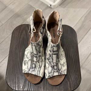 Snakeskin print wedge shoes. Size 9. Gently worn.